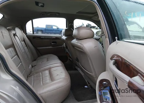 2001 Lincoln Town Car Signature z USA, uszkodzony, nr VIN 1LNHM82WX1Y633403